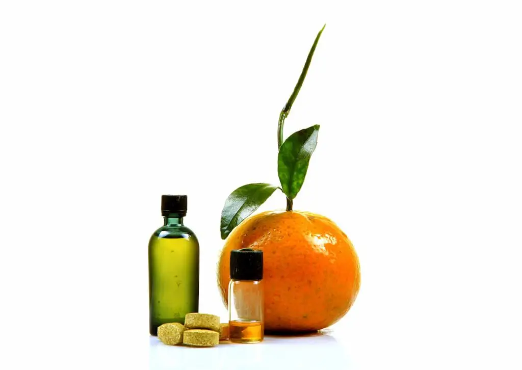 How Do Carnivores Get Vitamin C - Vitamin c tablets and liquid bottles with orange slices